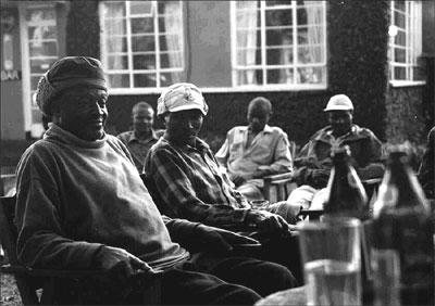 The End of the Trek and a Drink with the Porters and Guides at the Marangu Hotel, Tanzania